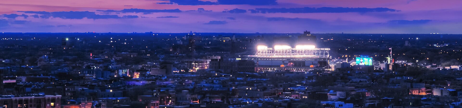 Goregous sunset view of Wrigley Field at night